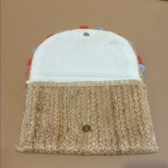 Straw Clutch with Colorful Pom Poms and gold accents - Picture 4 of 4